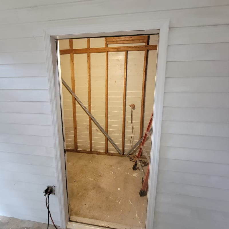 Empty carport shell, day one