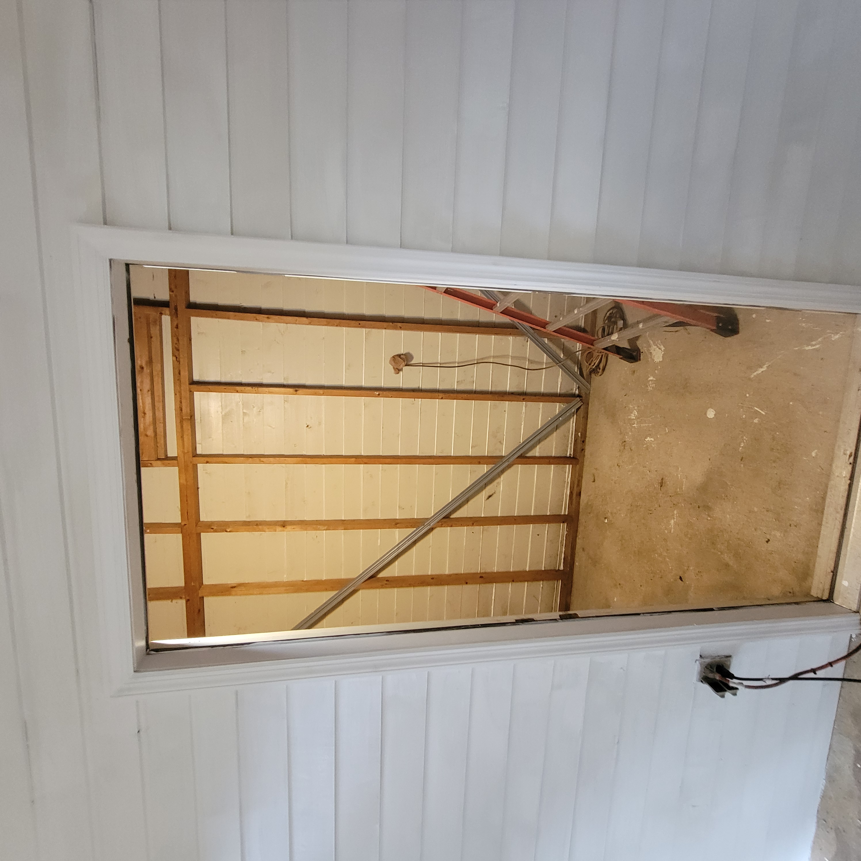 Empty carport shell, day one